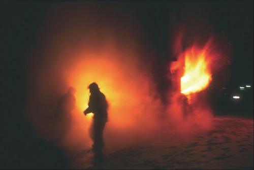 Firefighter fighitng a fire.